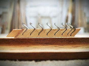 Close-up of pipes on table