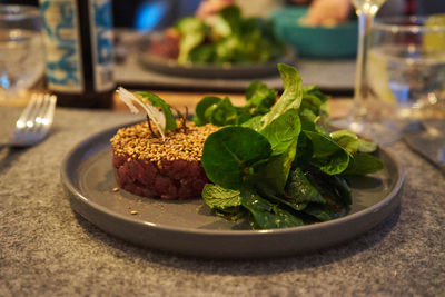 Close-up of salad in plate on table