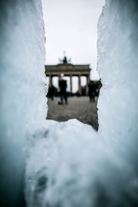 Close-up of snow against sky