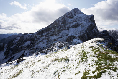 Scenic view of snowcapped mountains against sky in triglav national park slovenia