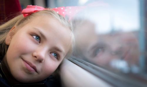 Close-up portrait of smiling girl