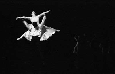 Close-up of leaf against black background