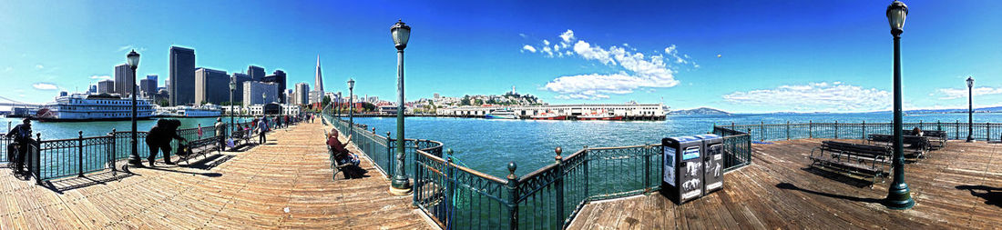 View of harbor against blue sky