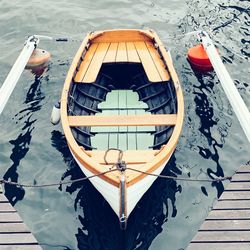 High angle view of moored sailboat on river