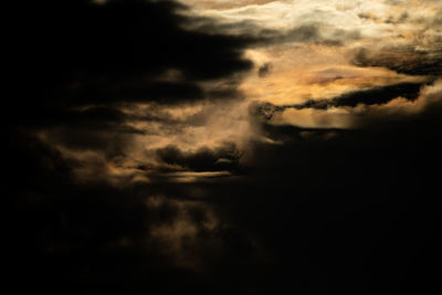 Low angle view of dramatic sky during sunset