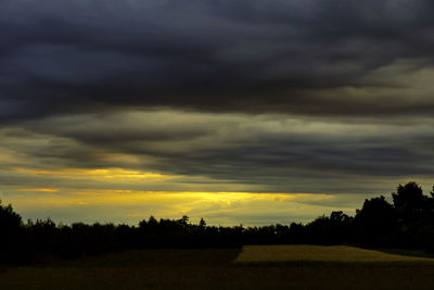 Scenic view of dramatic sky during sunset