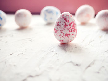 White foam eggs on blue background. flat lay, top view. easter concept.