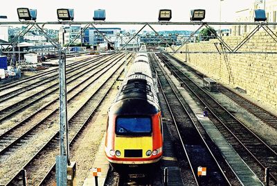 Train on railroad tracks against sky