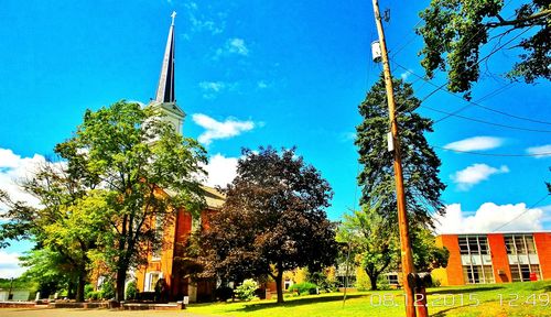 Low angle view of building against blue sky