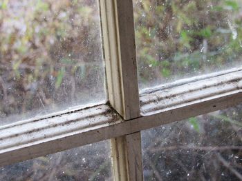 Close-up of wet window in rainy season