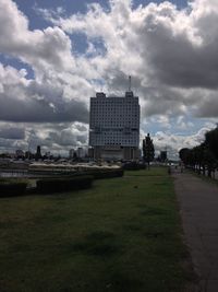 View of buildings against cloudy sky