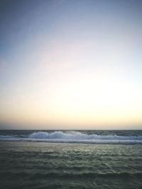 Scenic view of sea against clear sky during sunset