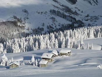 Scenic view of snow covered landscape and mountains