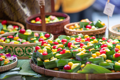 Close-up of multi colored vegetables on table at market stall