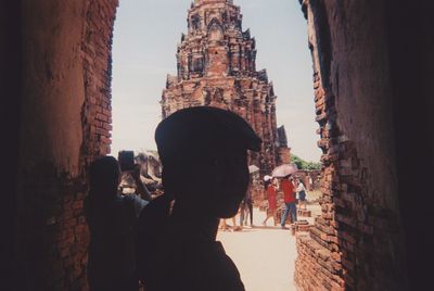 People in front of historic building