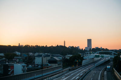 High angle view of city at sunset