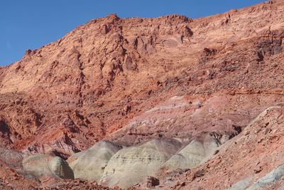 Multi colored pink, purple, orange bare rock hill