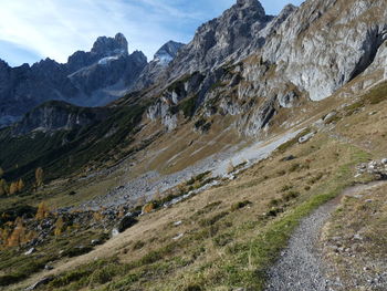 Scenic view of rocky mountains against sky