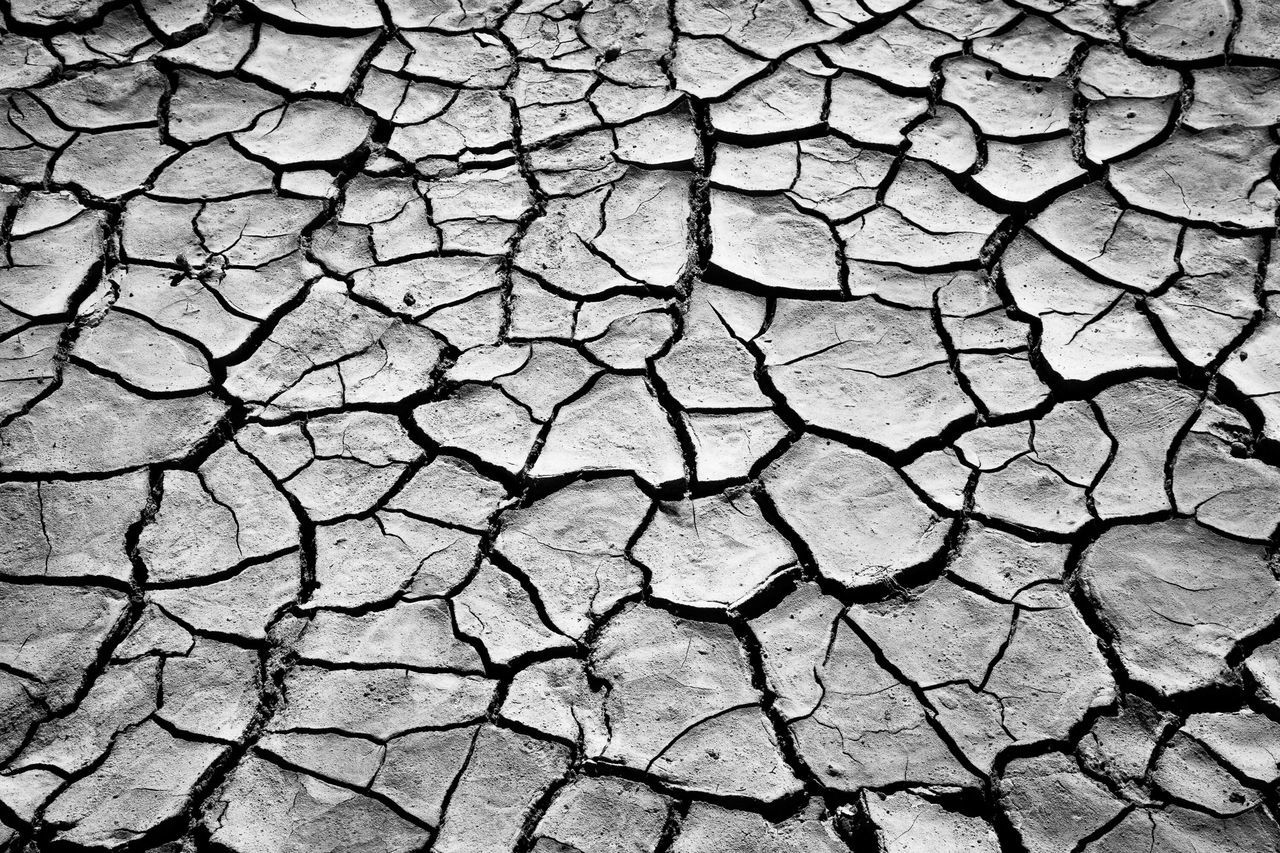 full frame, backgrounds, textured, pattern, cracked, natural pattern, high angle view, nature, dry, rough, no people, close-up, day, outdoors, cobblestone, detail, tranquility, rock - object, arid climate, stone - object