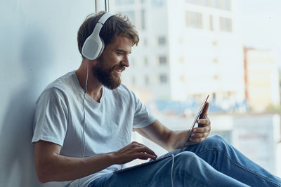 Young man using mobile phone