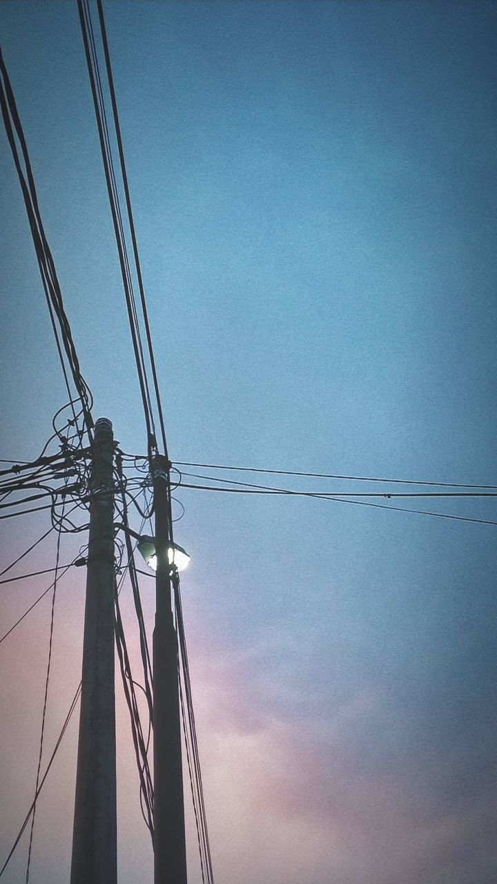 LOW ANGLE VIEW OF ELECTRICITY PYLON