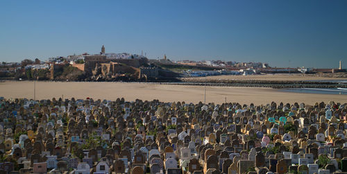 Panoramic view of sea against clear blue sky