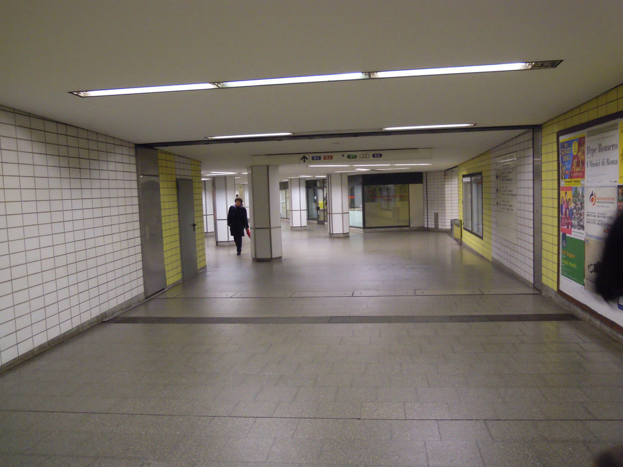 MAN WALKING IN SUBWAY