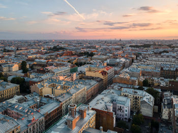 Aerial view on cloudy sunset above saint petersburg, russia. photo from drone. 