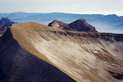 Scenic view of rocky mountains against sky