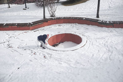 Person on snow covered field