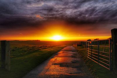 Scenic view of dramatic sky during sunset