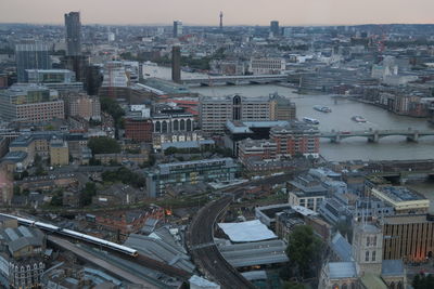 High angle view of buildings in city against sky