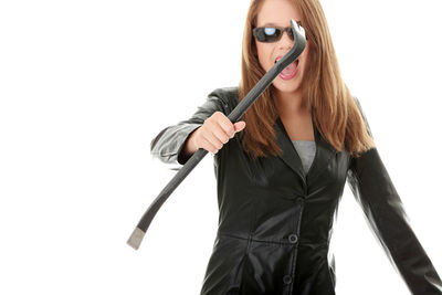 Portrait of woman standing against white background