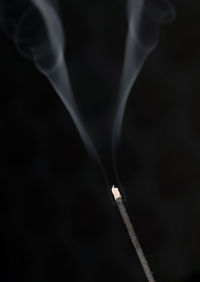 Close-up of fire against black background