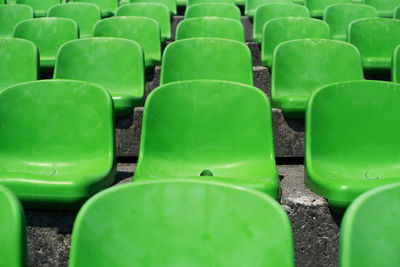 Full frame shot of empty chairs on stadium