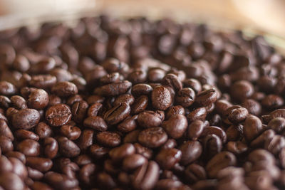 Close-up of coffee beans on table