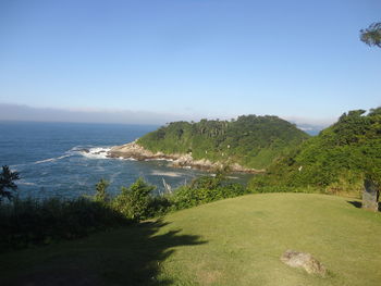 Scenic view of sea against blue sky