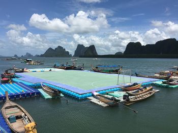 High angle view of boats on sea against sky