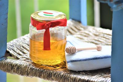 Close-up of drink in glass jar on table