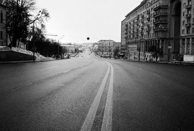 Road in city against sky