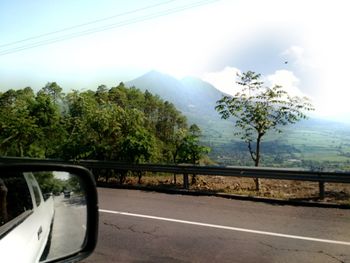 Road seen through car windshield