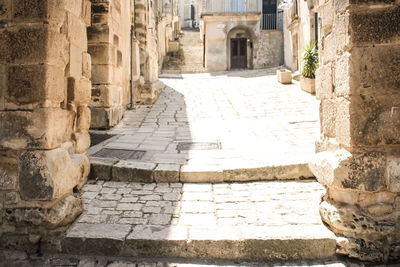 Alley amidst buildings in city