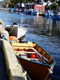 Boats moored at harbor