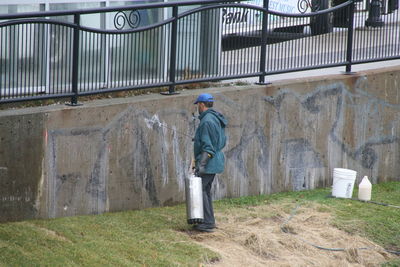 Man working on wall