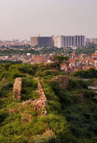 High angle view of buildings against clear sky