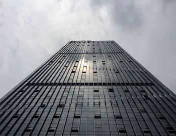 Low angle view of skyscraper against sky