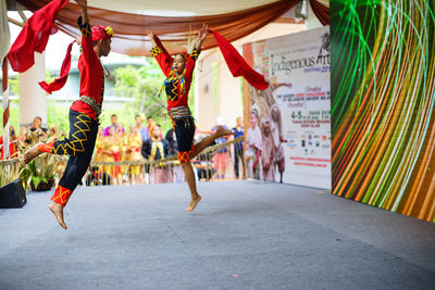 Group of people in traditional clothing during festival