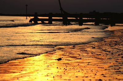 Scenic view of beach during sunset