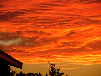 Scenic view of dramatic sky during sunset