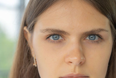 Close-up portrait of beautiful young woman